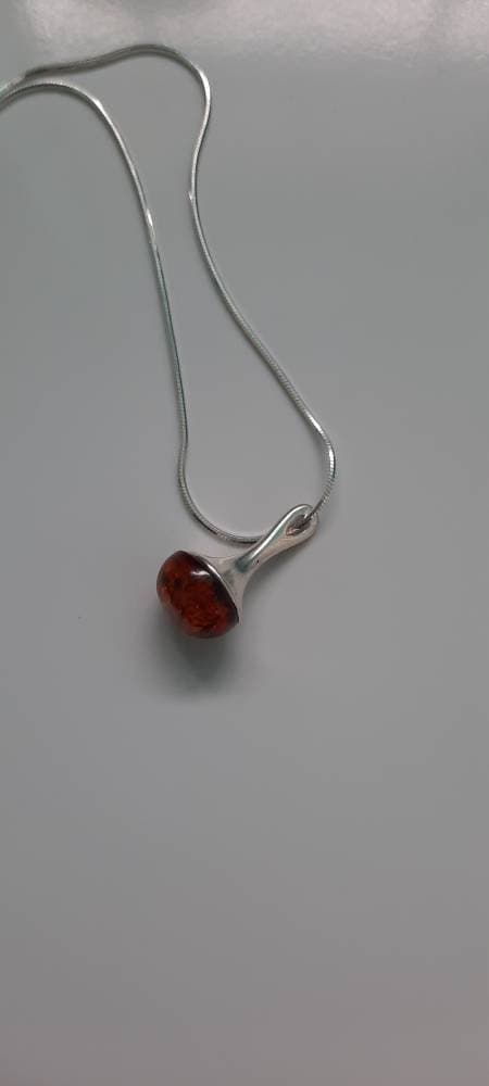 Elegant Round Cognac Amber and Sterling Silver Necklace.