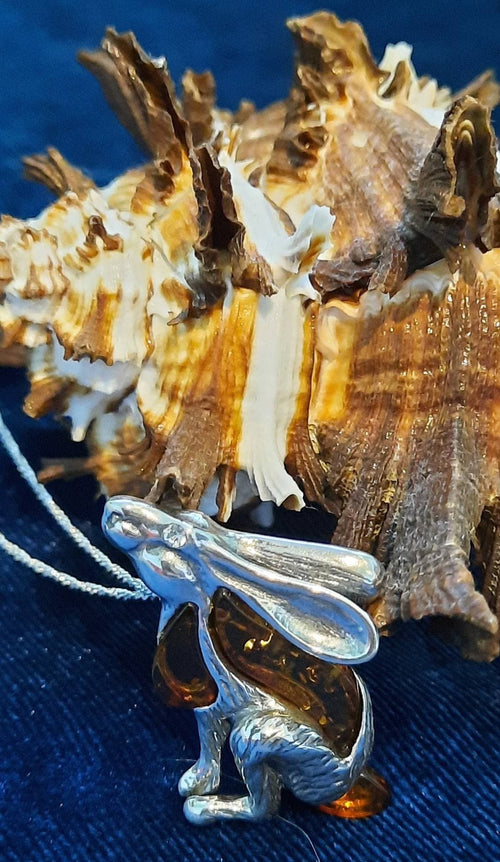 Beautifu designer sterling silver and cognac amber star gazing hare necklace