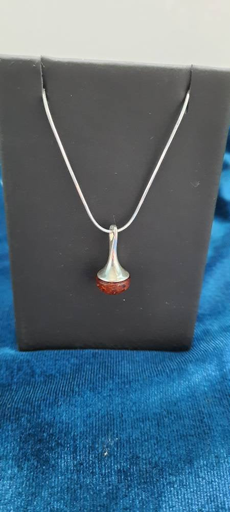 Elegant Round Cognac Amber and Sterling Silver Necklace.